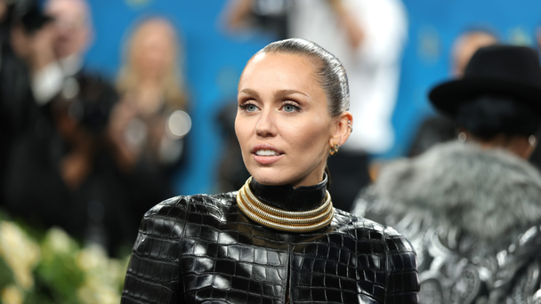 Miley Cyrus Rocks Bold, Ab-Revealing Look On 2025 Met Gala Red Carpet