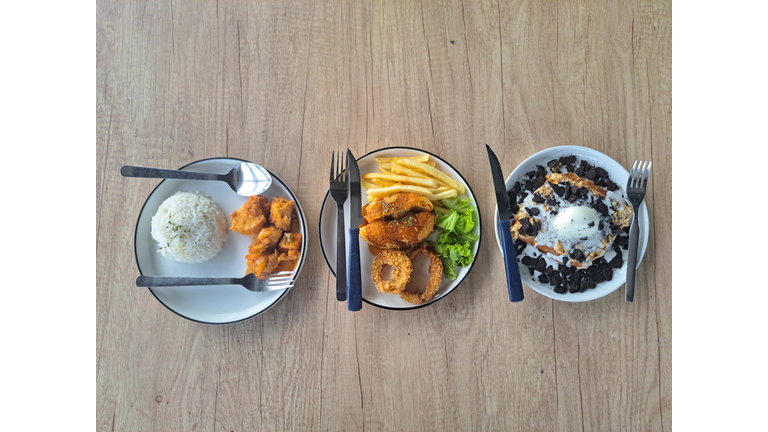 Nasi Ayam Asam Manis Or Sweet And Sour Chicken Rice. Chicken Cordon Bleu Is Smoked Beef & Chicken Wrapped In Cheese Inside With The Addition Of BBQ Sauce With French Fries, Onion And Salad. Misu Crofle Or Croffle Tiramisu With Biscuit Crunch Topping.