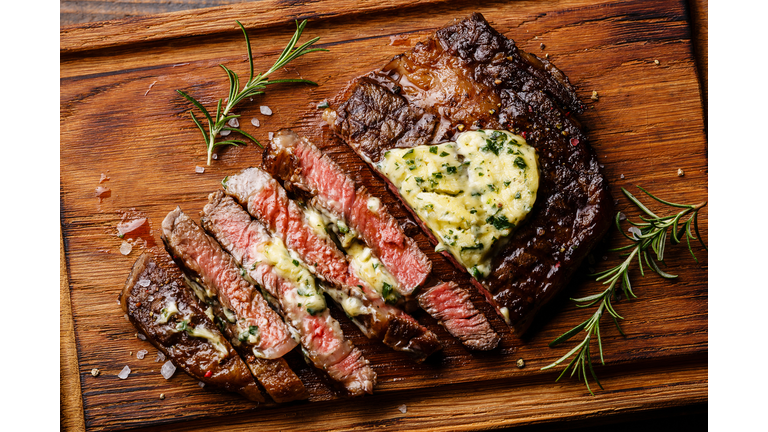 Sliced grilled steak Ribeye with herb butter
