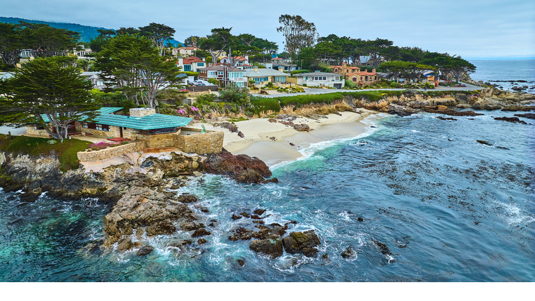 Aerial Clinton Walker House by Frank Lloyd Wright and Carmel Beach with houses