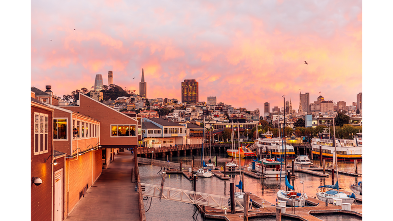Pier 39 and San Francisco skyline during dramatic sunset, California, USA