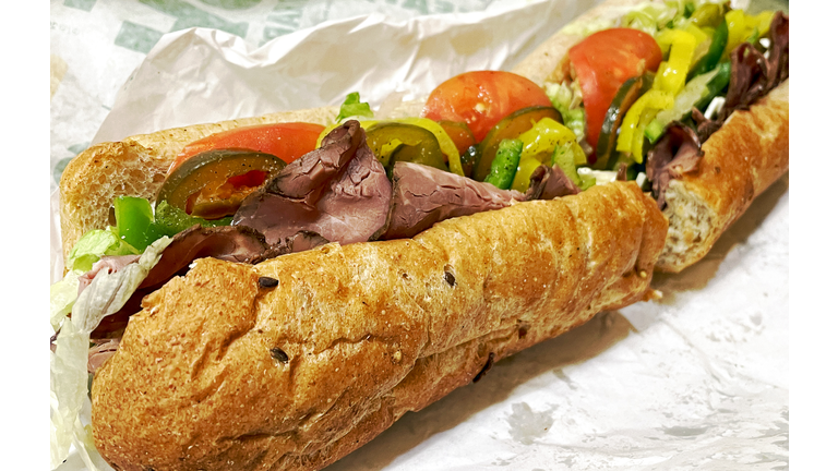 Fast food with a Roast Beef Submarine Sandwich with lots of veggies