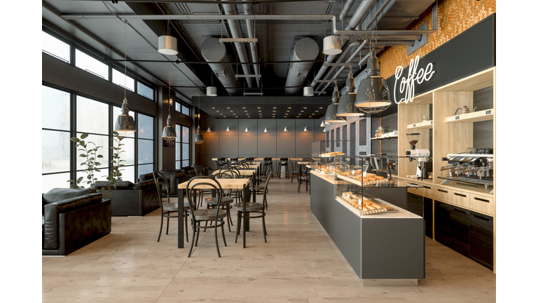 Empty Coffee Shop Interior With Wooden Tables, Coffee Maker, Pastries And Pendant Lights