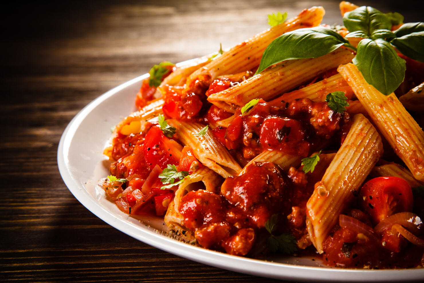 Pasta with meat, tomato sauce and vegetables