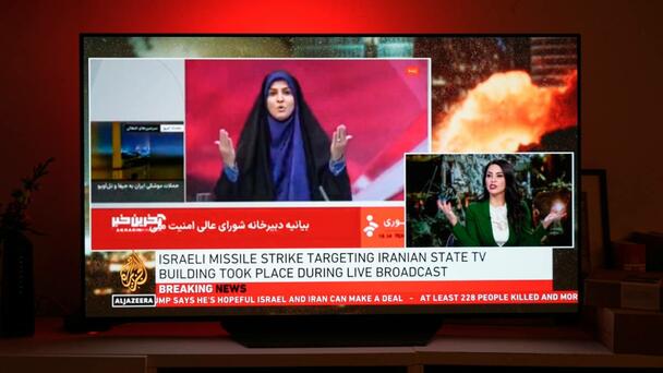 Dramatic Video Shows The Moment Iranian State TV Bombed While Live On Air