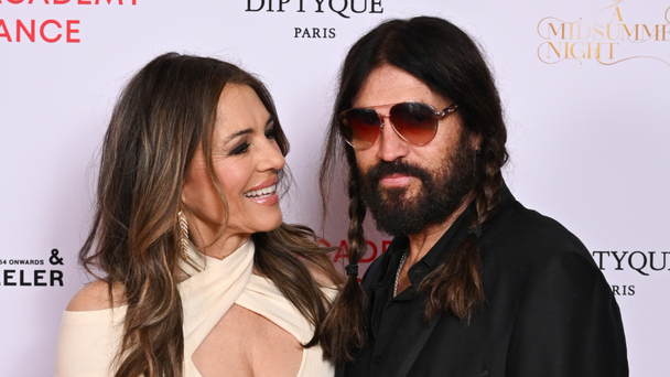 Billy Ray Cyrus Makes Appearance With 'Love Of My Life' Elizabeth Hurley