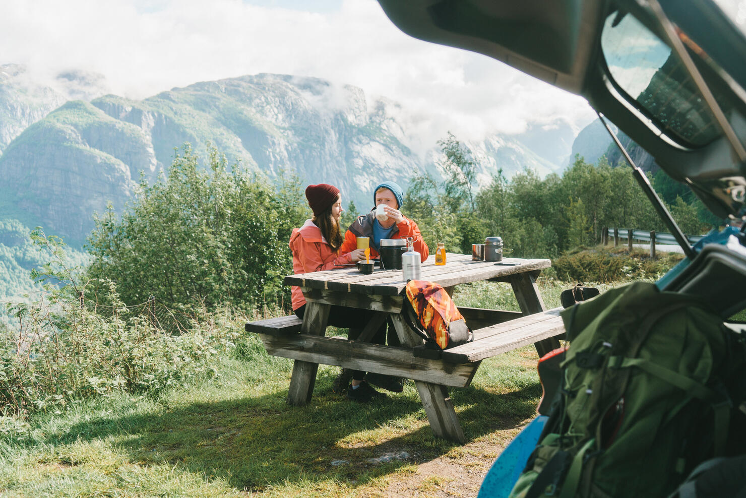 Couple have breakfast in mountains in Norway