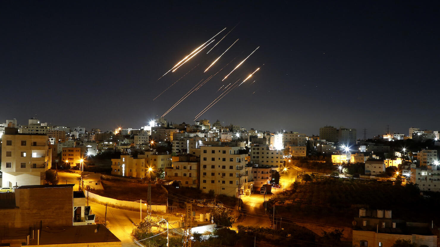 Iranian ballistic missiles illuminate night sky over Hebron, West Bank