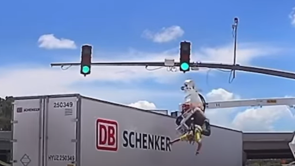Watch Semi Crash Into Bucket Truck...With Worker In Bucket at the Time!