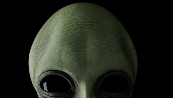 Watch: Eerie Alien-Like Head Filmed Peeking Out from Behind Car in Mexico