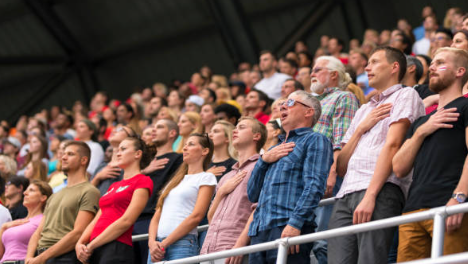Singer Faints During National Anthem 