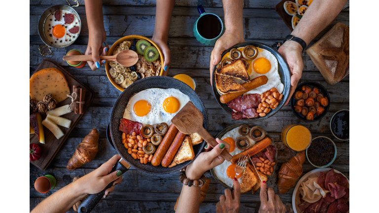 Close up view of breakfast table with family.