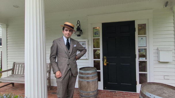 History Museum Director Making Waves With Elegant Outfits