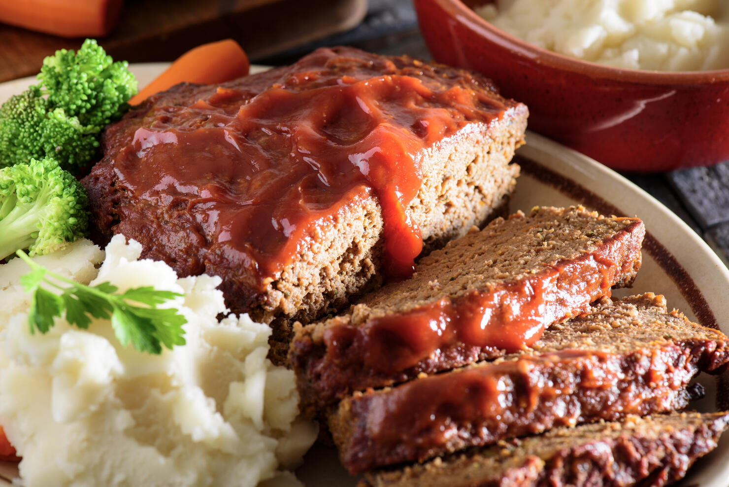 Fresh baked tomato glazed meatloaf served with mashed potato
