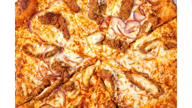 Close up full frame chicken pizza dish