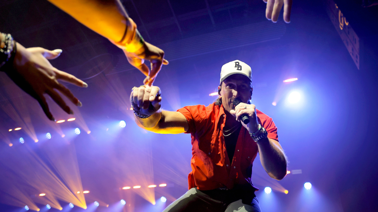 Watch Russell Dickerson's 'Over-The-Top' Energy Among Growing Crowd