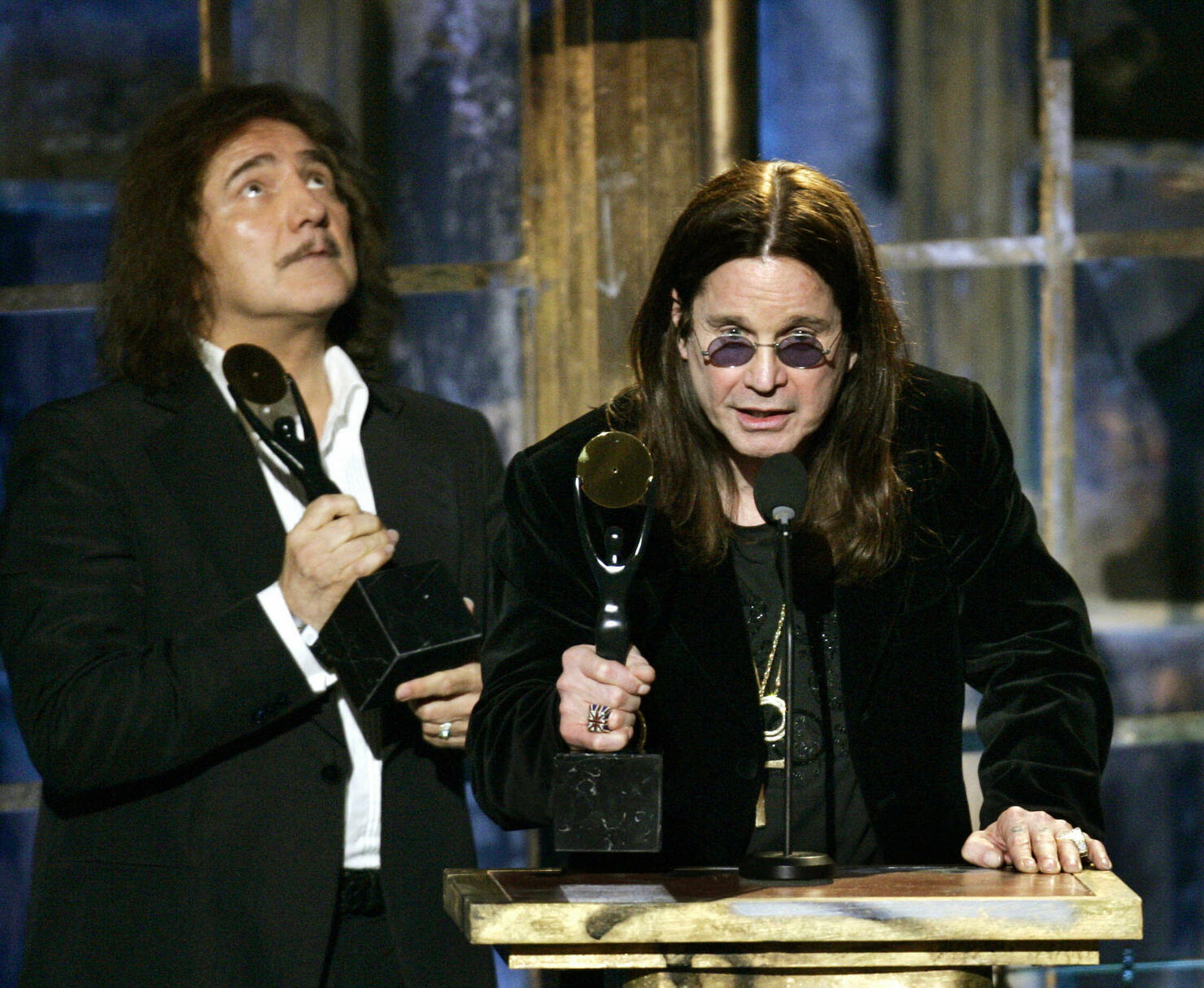 Inductees Ozzy Osbourne (R) and Geezer B