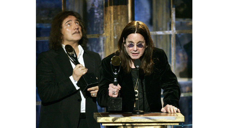 Inductees Ozzy Osbourne (R) and Geezer B
