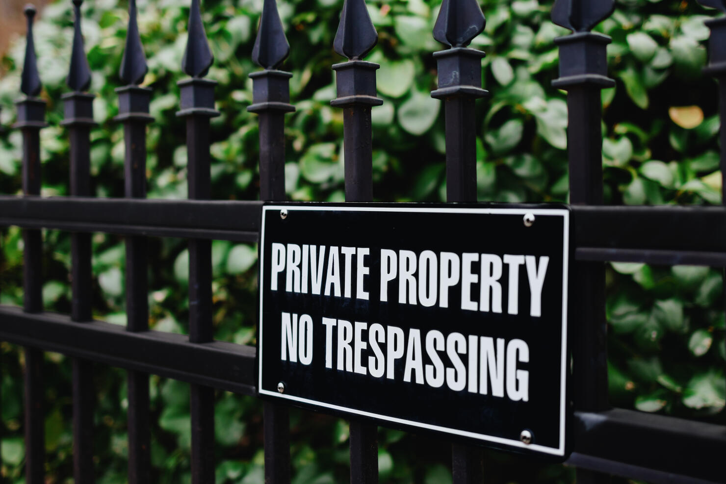 No Trespassing Sign on Fence