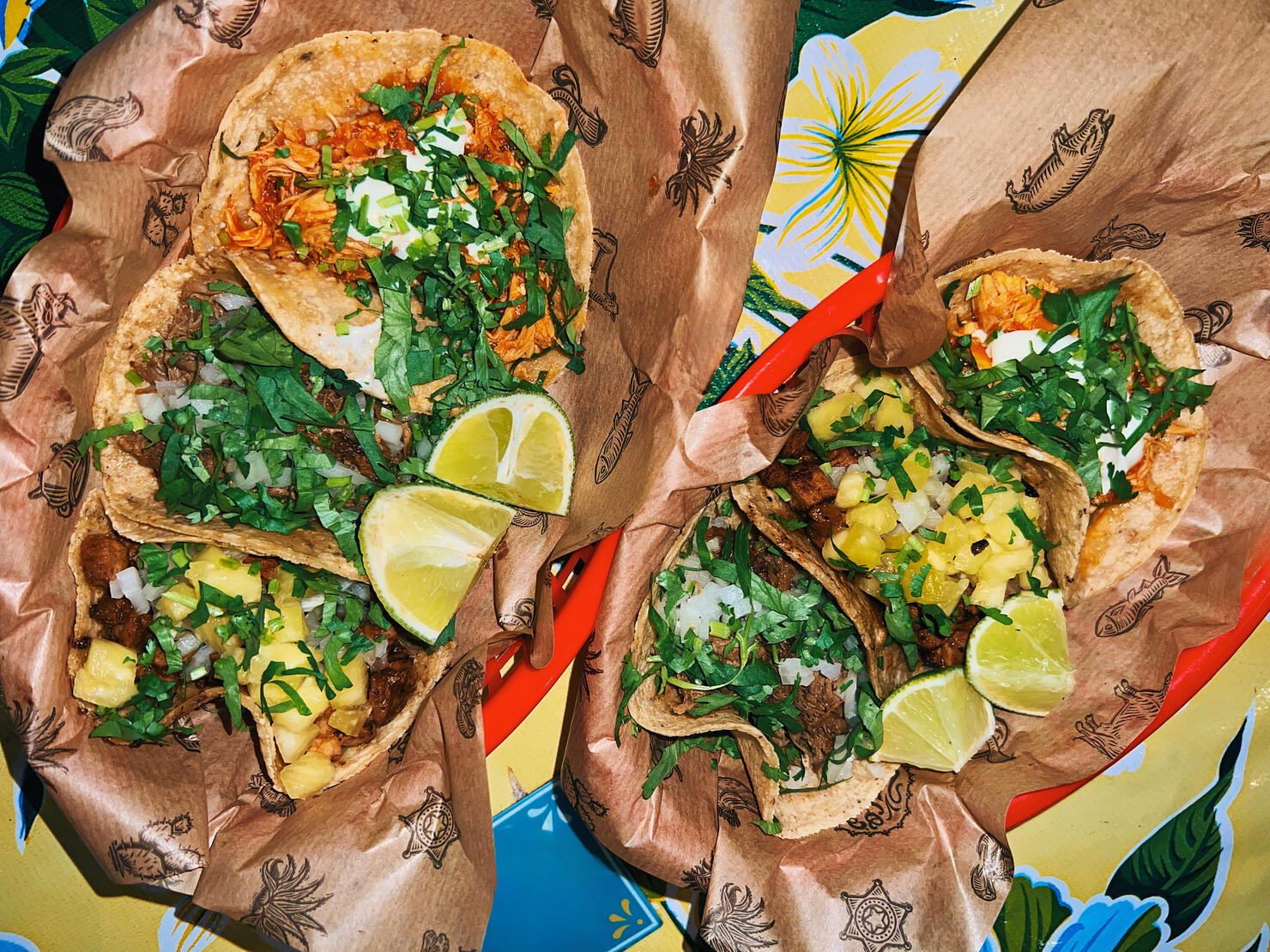 Various tacos served at a Mexican restaurant