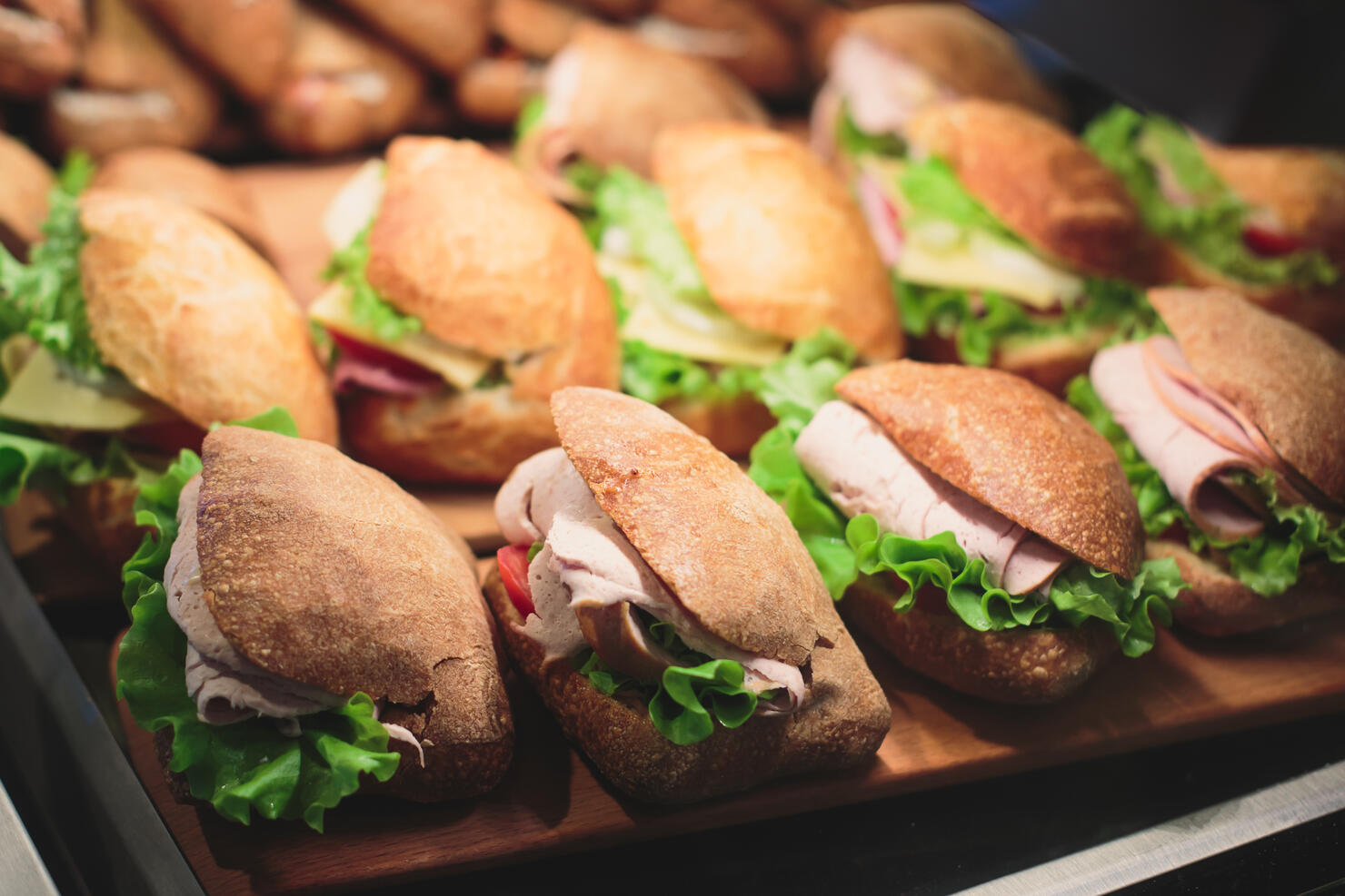 Beautifully decorated catering banquet table with sandwiches