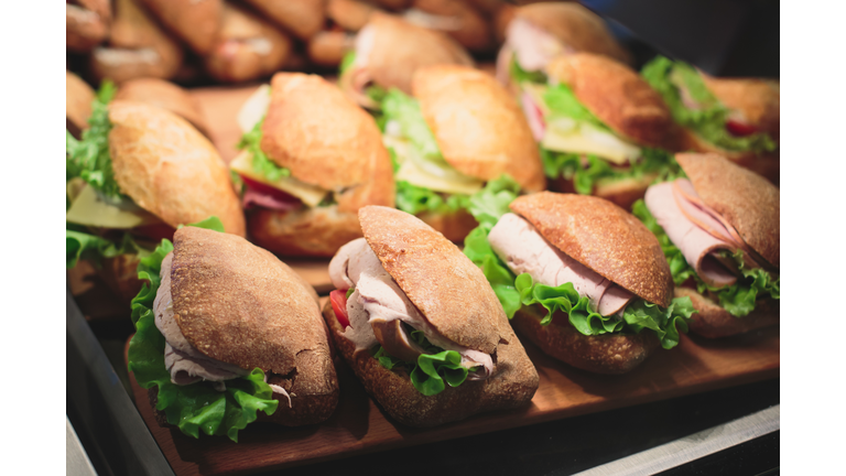 Beautifully decorated catering banquet table with sandwiches