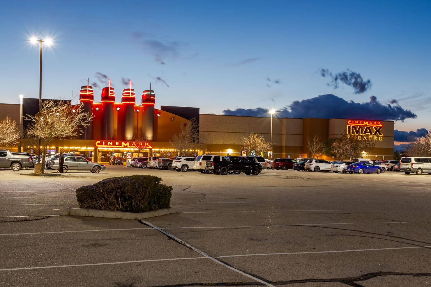 Cinemark IMAX theater illuminated in twilight in Lancaster, California