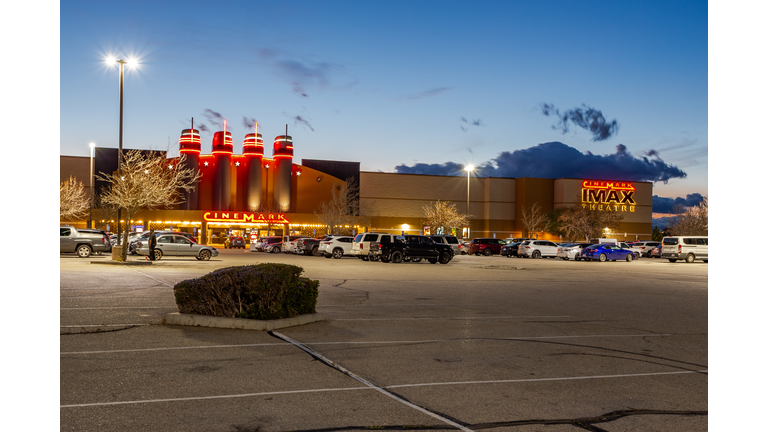 Cinemark IMAX theater illuminated in twilight in Lancaster, California