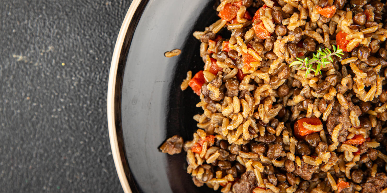 Rice lentil and vegetables snack fresh tasty food dish vegetarian vegan food no meat delicious gourmet food background on the table rustic food top view copy space keto and paleo diet