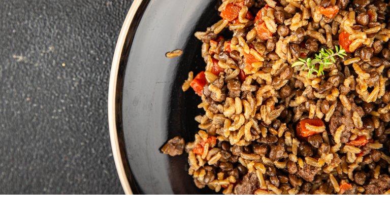 Rice lentil and vegetables snack fresh tasty food dish vegetarian vegan food no meat delicious gourmet food background on the table rustic food top view copy space keto and paleo diet