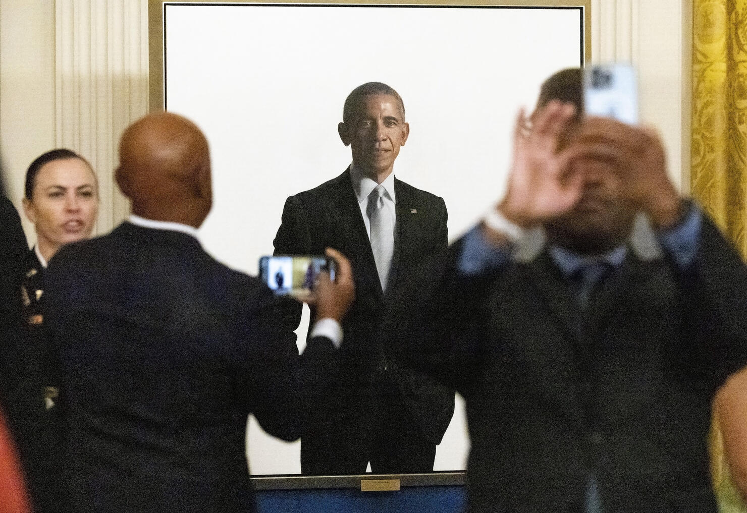 Barack And Michelle Obama Return To White House For Official Portrait Unveiling