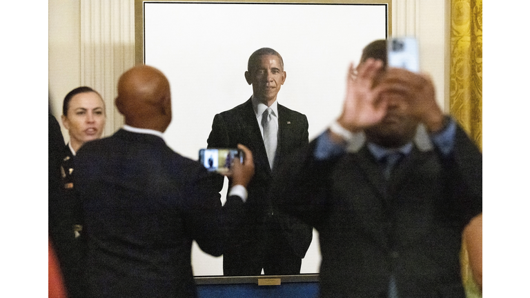 Barack And Michelle Obama Return To White House For Official Portrait Unveiling