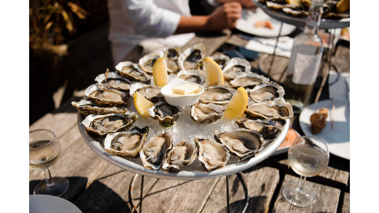 Tasty oysters on the plate on the table