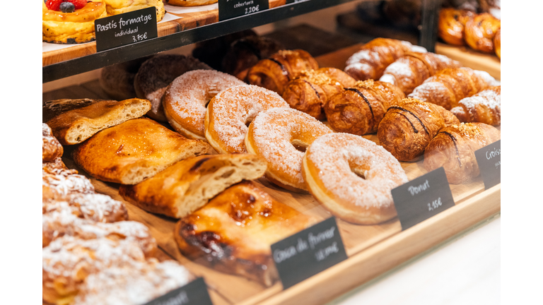Fresh sweet pastry on a display in bakery