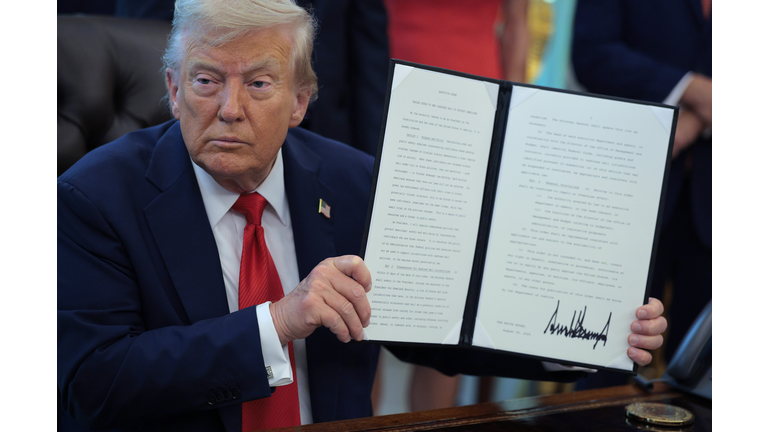 President Trump Signs Executive Orders In The Oval Office Of The White House