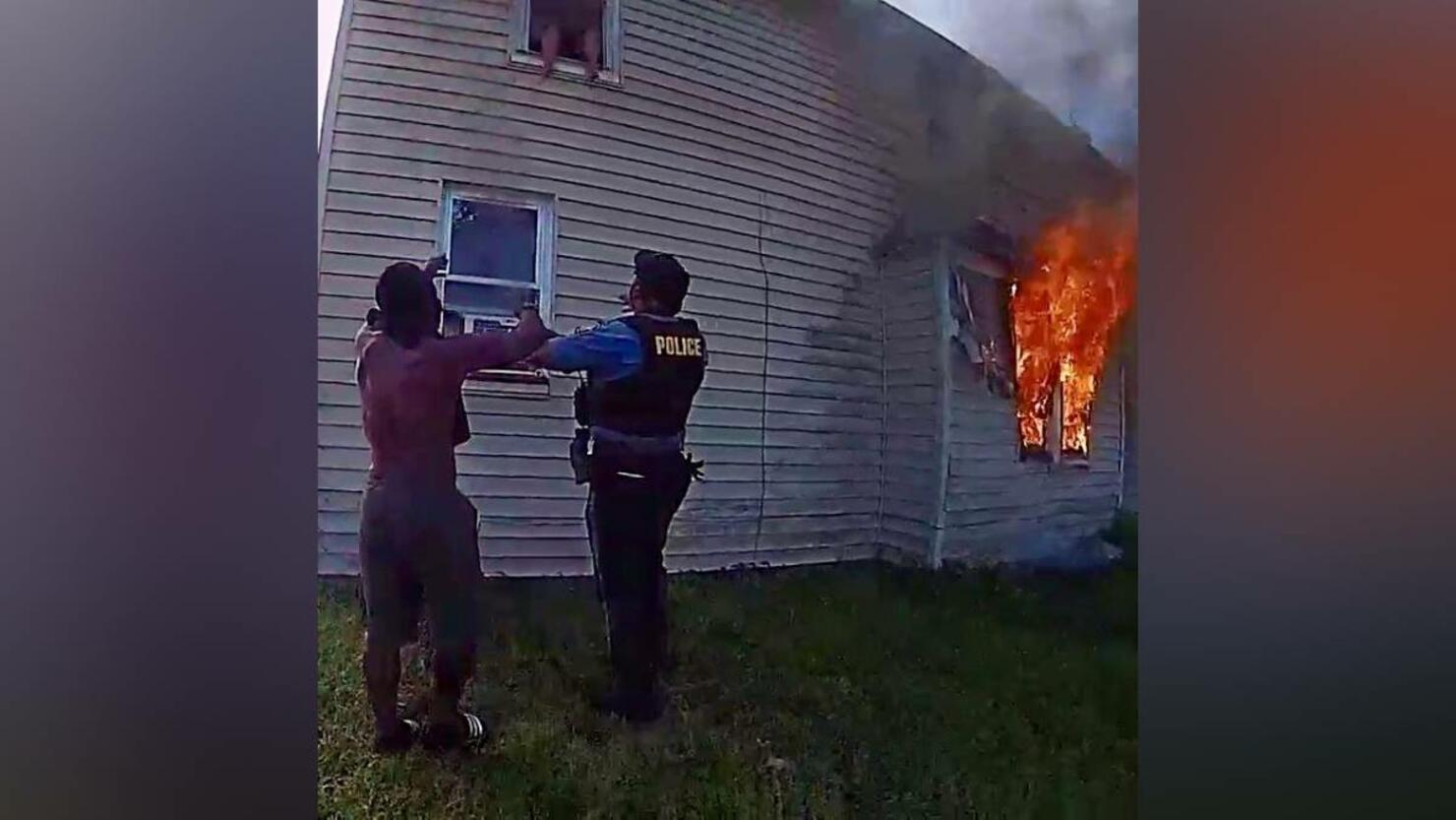 Cops rescue boy from burning building