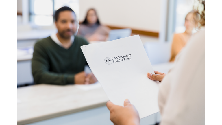 Unrecognizeable person holds exam