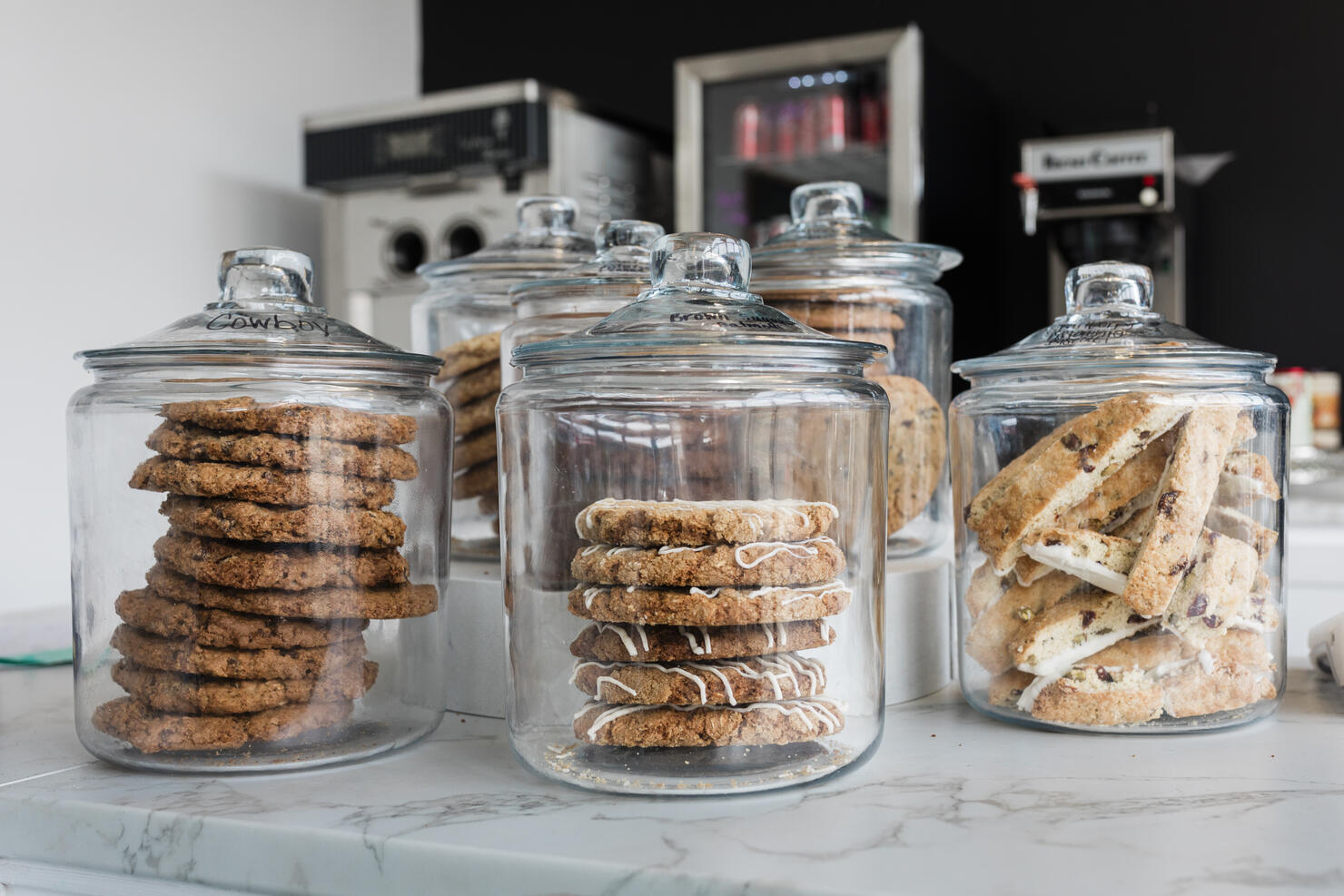 Elegant Glass Jars Filled with Assorted Cookies