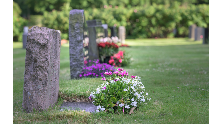 Old tombstones with flowers decorated