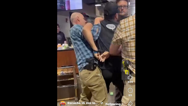Man Handcuffed, Taken Away By Men Armed With Charged Taser In Iowa City 