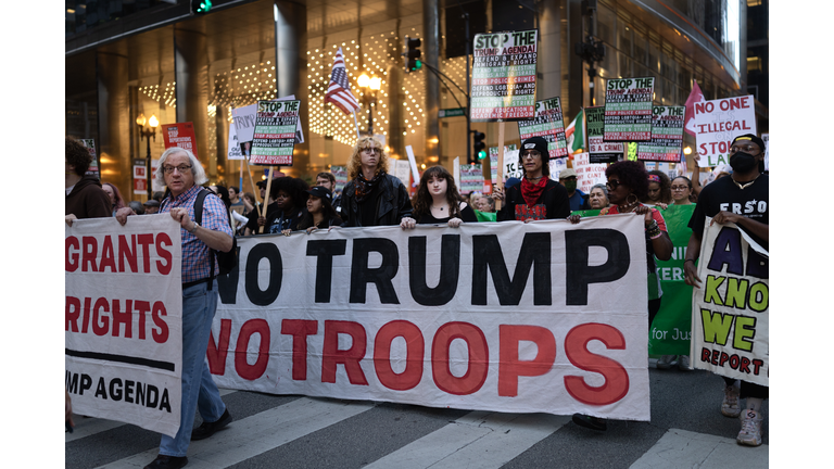 Protestors Rally In Chicago Against ICE Raids