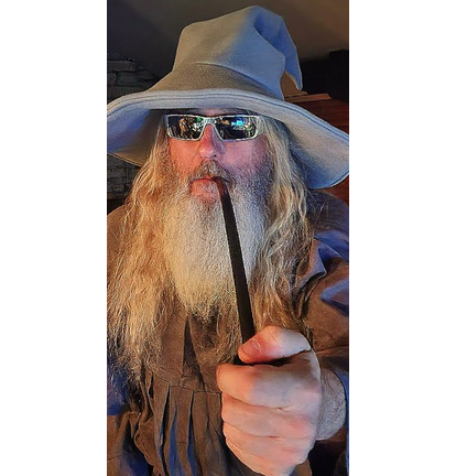 a photo of chicago rock dj patrick capone in his Gandalf outfit