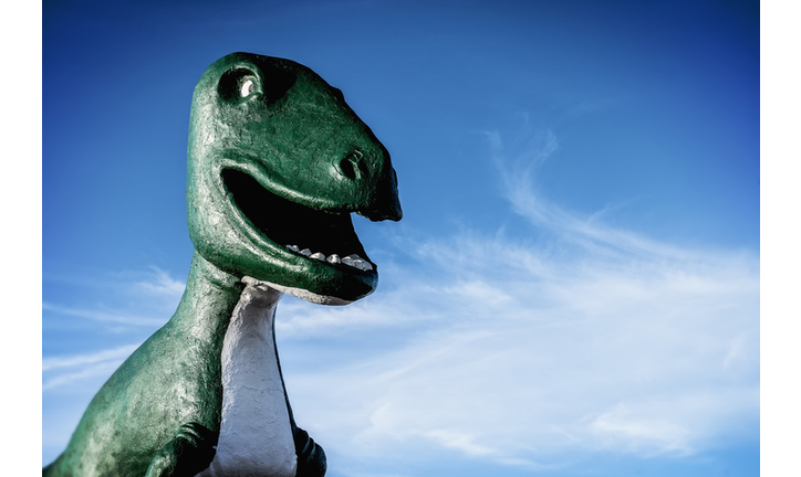 Tyrannosaurus Rex statue under blue sky