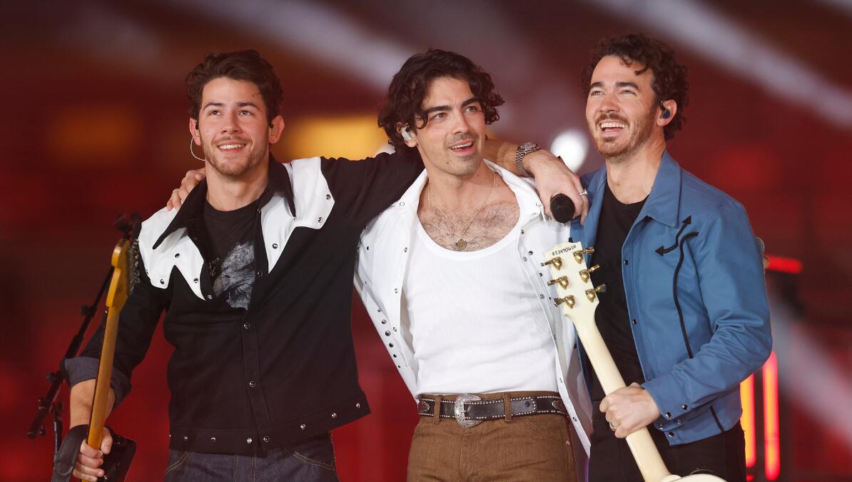 Jonas Brothers Help Concertgoer With Gender Reveal In Sweet Moment On Stage