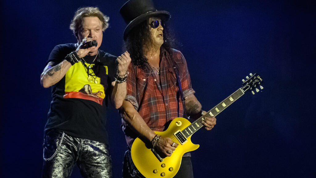 Axl Rose Throws Mic and Kicks Drum Set at a Recent Show