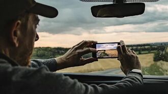 Motorist Photographs Flying Saucer Hovering Over Hill in Mexico