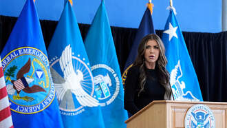 Kristi Noem Speaks At Bush Airport, Hands Out Bonus Checks 