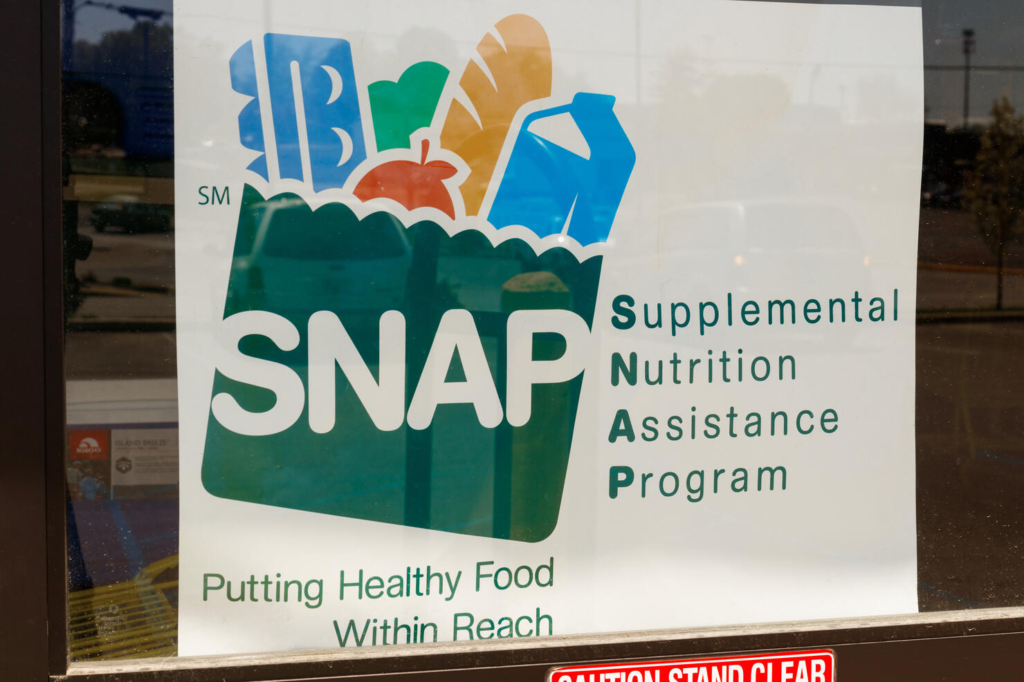 A Sign at a Retailer - We Accept SNAP IV