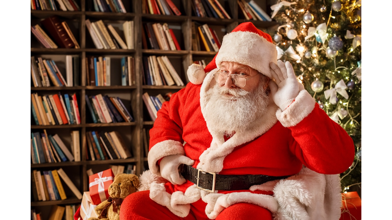 Santa Claus in the library christmas new year concept