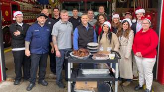 Revere Hotel In Boston Delivers Thanksgiving Feast To Local Fire Station